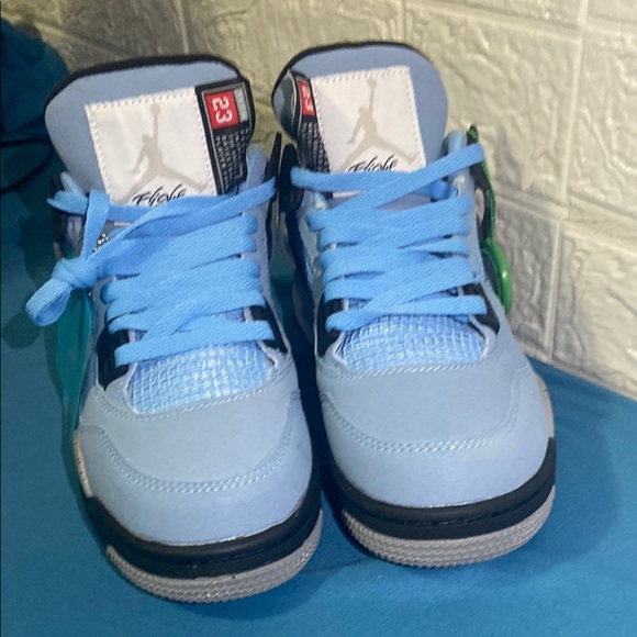 Air Jordan 4s retro university blue main image 4